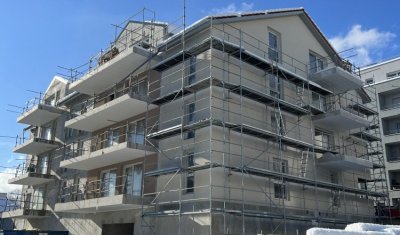 Réalisation de façade d'un immeuble à Gex 